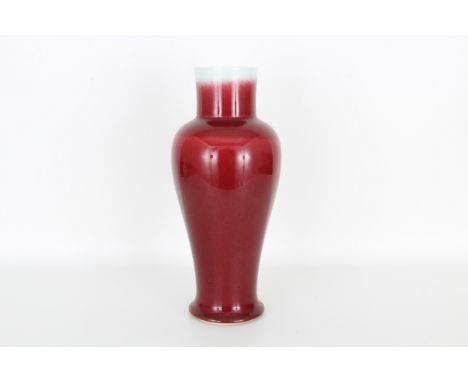Chinese underglaze copper red vase, Kangxi mark.Provenance: Private Montreal, Canada estate.Dimensions: 13 x 5.5 in.
