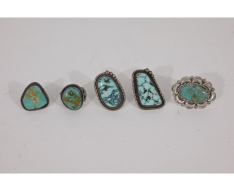 (5) Assorted Native American Turquoise Silver Rings. (4) of them marked verso on rings.Ring Sizes (L-R): 5.5 / 6.5 / 8.5 / 7.