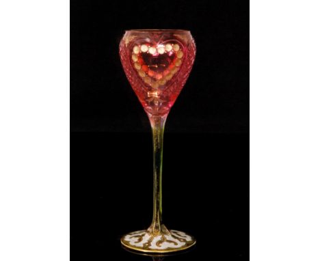 An early 20th Century Continental wine glass in the manner of Theresienthal with an enamelled and gilded green circular foot 