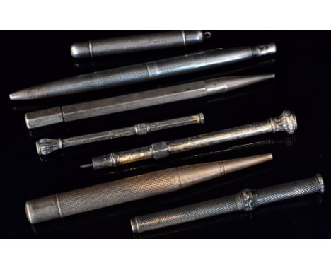 Seven assorted 19th Century and later hallmarked silver and sterling silver slide and propelling pencils, to include a S. Mor