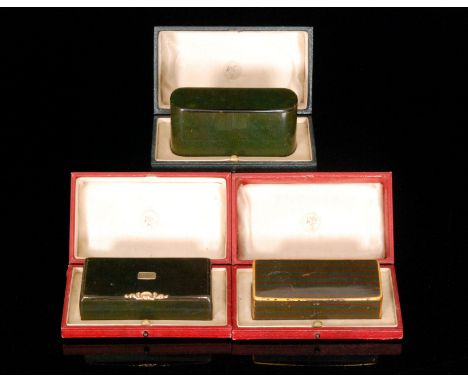 Three late 19th to early 20th Century papier mache snuff boxes to include a marbled effect box, width 9.5cm, a shagreen effec