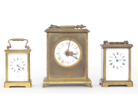 A small 19th century brass carriage clock with white painted dial by E Seaton Torquay, striking on a gong, together with a si