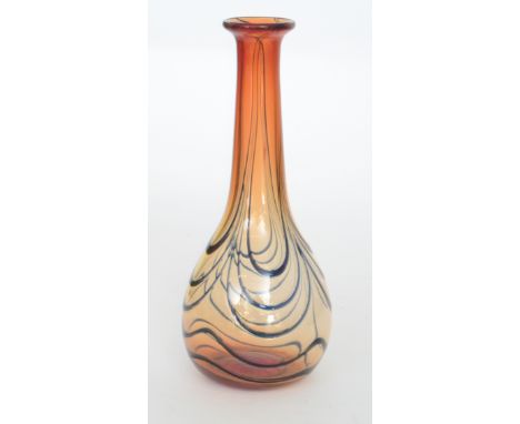 An early Richard P. Golding Studio glass vase of globe and shaft form with everted rim, decorated with pulled loops over a gr