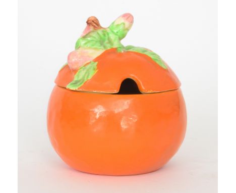 A Clarice Cliff Newport Pottery marmalade pot formed as an orange, printed marks, height 10cm 