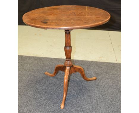 A 19th Century oak circular tripod occasional table on turned pedestal and splayed tripod legs, width 60cm