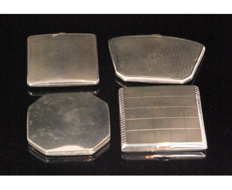 Three hallmarked silver powder compacts, one of square form with chequerboard engine turned design, another of square shape, 