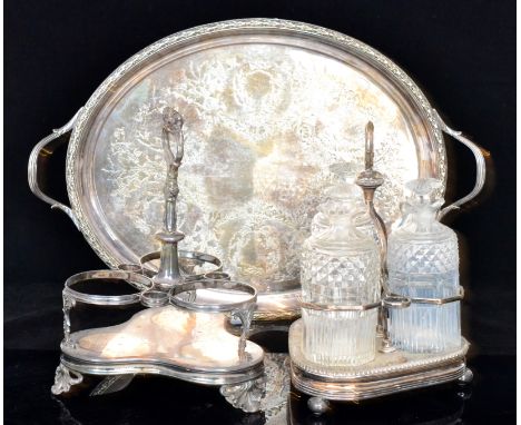 A parcel lot of silver plated items to include a late 19th Century silver plated oval twin handled tray decorated with engrav