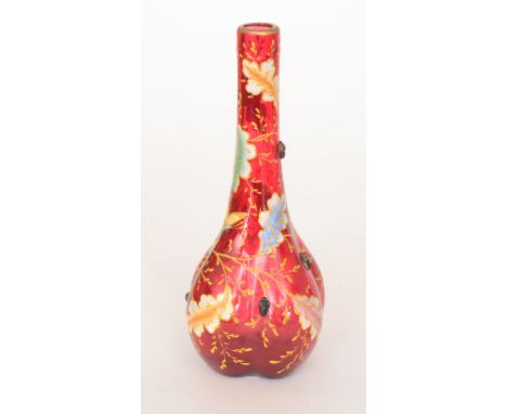 A 19th Century Moser vase of quatrelobed form with a slender collar neck decorated with applied acorn prunts and hand enamell