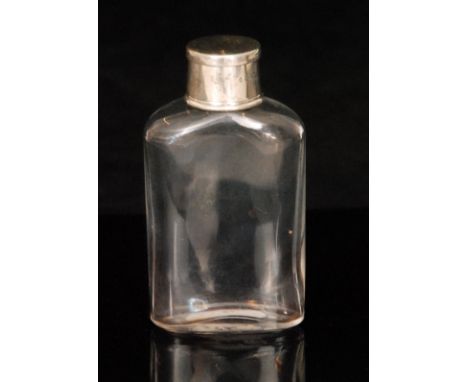 A Victorian hallmarked silver and clear glass flask, plain glass bottle below silver screw cap which converts to a telescopic