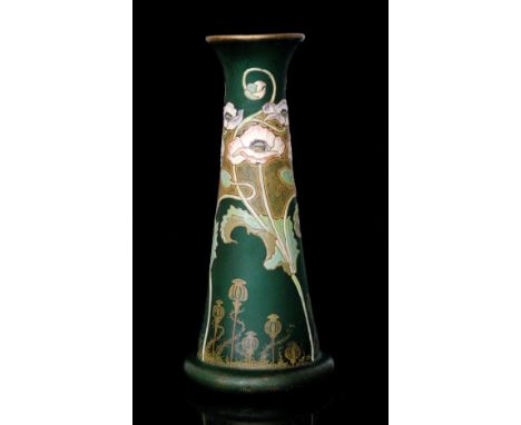 An early 20th Century Continental Art Nouveau vase in the manner of Mont Joye & Coe of footed tapered cylindrical form with f