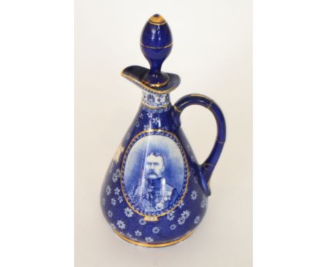 An early 20th Century Centenary Souvenir advertising decanter made for Jas Watson & Co Ltd, Distillers Est 1815, printed with