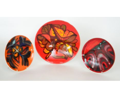 A Poole Pottery Delphis shape 4 bowl decorated in the typical manner with a brightly coloured abstract motif against a bright