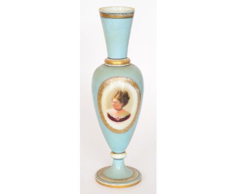 A large late 19th Century Continental opaline glass vase of slender footed, baluster form with a flared collar neck, enamel d
