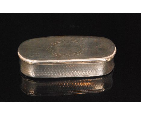 A Victorian silver snuff box of oval cushion form with foliate thumb-piece, worn, width 7.5cm, Birmingham 1872. 