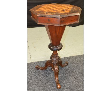 A Victorian inlaid walnut sewing table of trumpet form, the hinged octagonal chequered top enclosing a fitted interior, raise