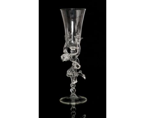 A contemporary Italian Murano glass goblet with a folded circular spread foot below a lamp work stem modelled as a male nude 