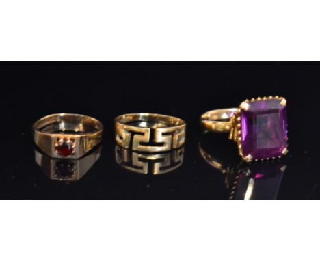 A modern 18ct amethyst dress ring, the oblong stone within raised setting to plain shank, ring size N, together with a 14ct g