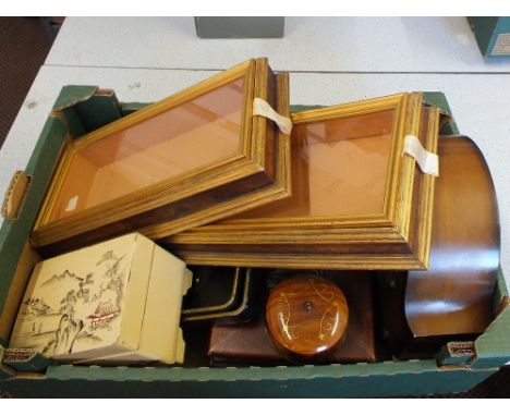 A striking mantel clock, small display cases etc