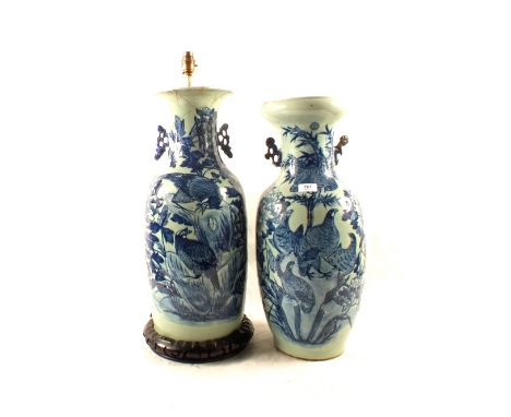 A pair of 19th Century Chinese blue and white bird and floral vases (with damage, one lamp conversion), height 22"