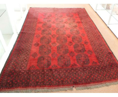 An Afghan carpet, 117" x 80"