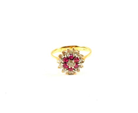 An 18ct Gold Ruby and Diamond ring, size L