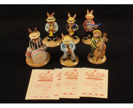 Eight Royal Doulton Bunnykins 'The Jazz Band Collection', Banjo Player DB182 No.1333, Saxophone Player DB186 No.1165, Trumpet