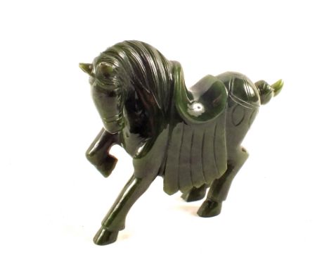 A Jade carving of a horse, signed C.R.Wang, length 5 1/2"