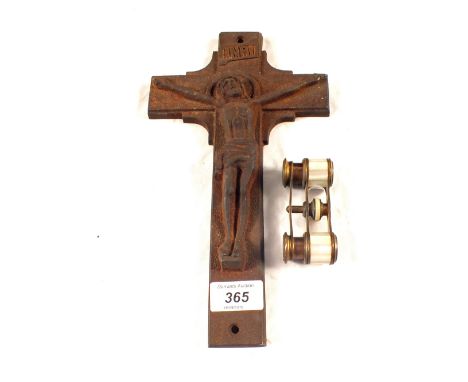 A pair of Mother of Pearl opera glasses and an iron crucifix