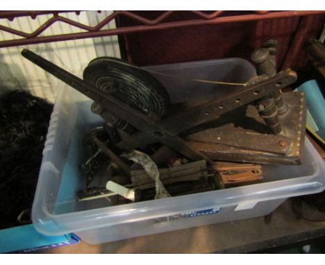 A bygone small bobbin winder together with period mourning lace remnants