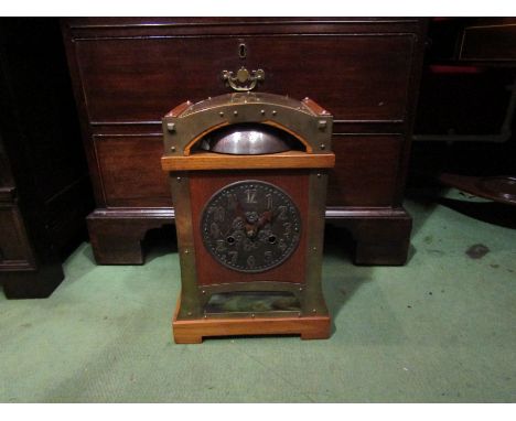 An Arts &amp; Crafts "Liberty" style oak mantel clock with pendulum and key, 36.5cm tall x 24.5cm wide