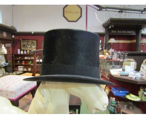 A vintage top hat by Dunn &amp; Co