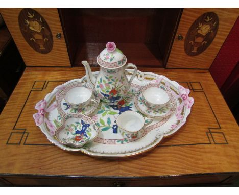 A Herend porcelain tea set for two consisting of teapot, pair of tea cups and saucers, sucrier and milk jug together with tra