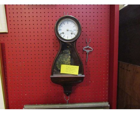 Small rosewood veneer wall clock (15" high x 6" wide), serpentine shape, signed by Hy. Marc Paris on dial and movement, strik