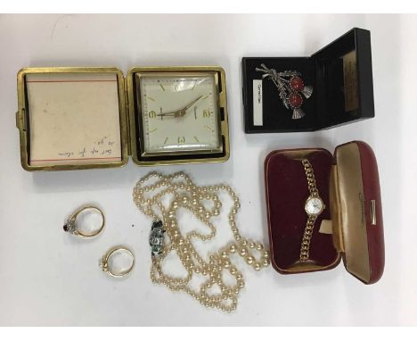 Ladies 'Regency' 9ct gold wristwatch on 9ct gold bracelet, travel alarm clock, simulated pearl necklace, brooch and two gilt 