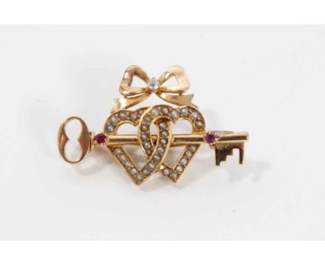 Late Victorian 15ct gold diamond, ruby and seed pearl sweetheart brooch with a gold key and two interlocking hearts surmounte