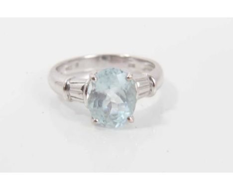 Aquamarine single stone ring with an oval mixed cut aquamarine measuring approximately 10.05mm x 7.85mm x 5.35mm, in four cla