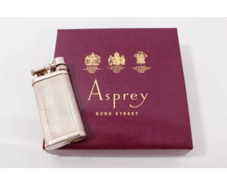 Vintage Dunhill silver plated pocket lighter with engine turned decoration, 7cm high, in Asprey card boxCondition report: The