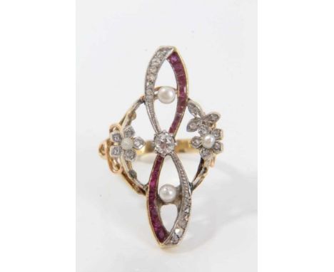 Art Nouveau French diamond ruby and seed pearl ring, the openwork plaque with a central old cut diamond, ribbon and floral sc