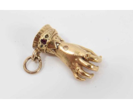 19th century yellow metal charm in the form of a hand, set with ruby, probably originally a clasp. 20mmCondition report: We a