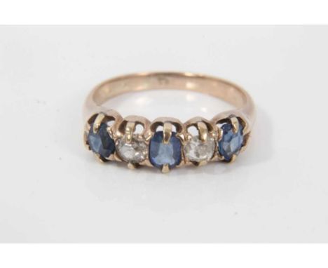 Late Victorian diamond and sapphire five stone ring with two old cut diamonds and three mixed cut blue sapphires in claw sett