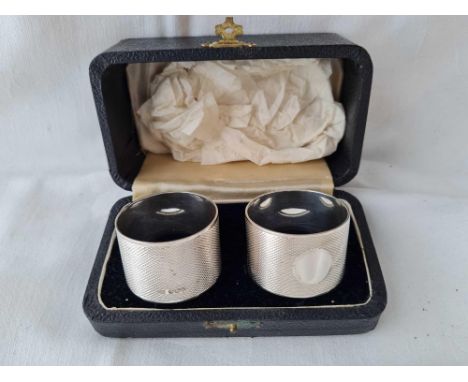 Another pair of boxed napkin rings plain engine turned. Sheffield 1938 By E V. 89gms