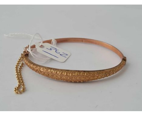 A hinged bangle 9ct - 5.1 gms 