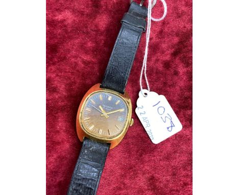 A gents Sekonda wrist watch with seconds sweep and date appature