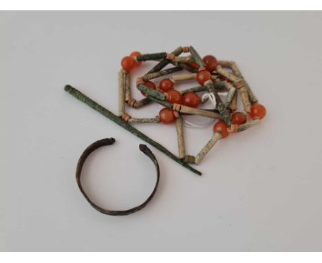 A Egyptian style bead necklace and Roman stylus and child's bangle 