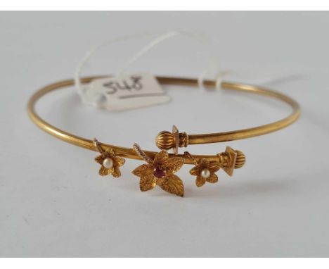 A Victorian gold pearl and ruby bangle - 4.6 gms 
