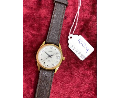 A gents gradus incabloc wrist watch with seconds sweep and date appature W/O 