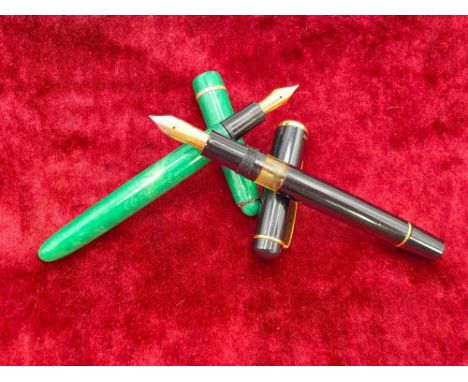 A green Osmiroid fountain pen together with a black Flair My-pen fountain pen 