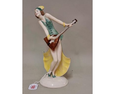 An unusual Goebel Art Deco figure of a lady musician, 26cm high.&nbsp; 