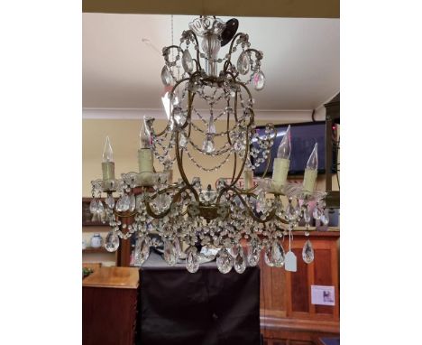 An old gilt metal and facetted bead drop six branch chandelier,&nbsp;57cm high. 