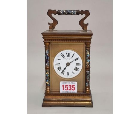 An antique gilt brass and champleve enamel carriage clock, striking on a gong, height including handle 17.5cm, (s.d. to dial)